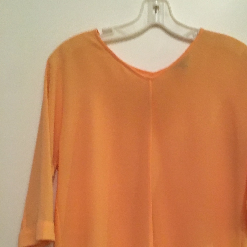 Orange sheer quarter-length sleeve top